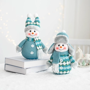 Knitted snowman dolls in teal and grey for Christmas counter and window display decoration
