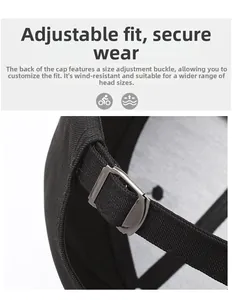 Close-up of adjustable metal buckle and fabric strap on a black baseball cap