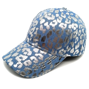 Leopard print denim baseball cap with metallic silver pattern on blue fabric