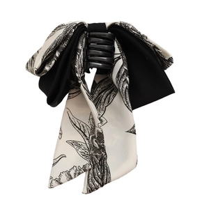Pince à cheveux élégante avec nœud de style lavis et motifs floraux noirs et beiges