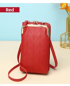 Detail of red quilted faux leather phone bag with gold metal clasp and zipper pocket
