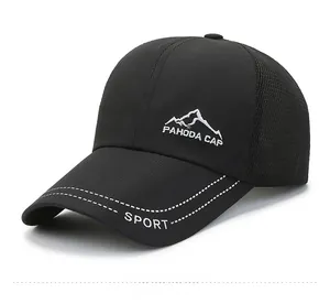 Detail of black mesh trucker hat featuring mountain logo and white SPORT embroidery