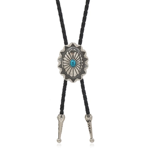 Detail of western bolo tie with sunflower alloy pendant and turquoise stone inlay