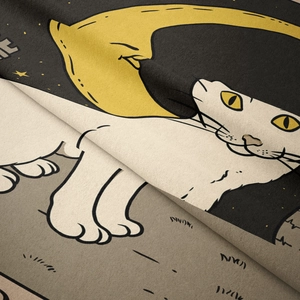 Close-up of soft flannel texture with cute cat and crescent moon illustration print