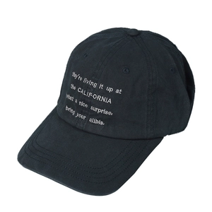 Black cotton baseball cap with white California embroidery and curved brim in plain view
