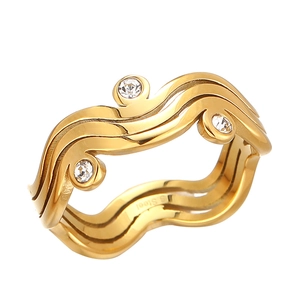 Gold wavy stainless steel ring with triple layered bands and sparkling crystal stones