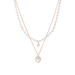 Double layer necklace with pearls and heart pendant on a clean white background