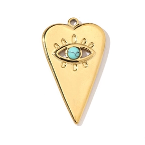 Macro detail of heart-shaped gold pendant featuring a turquoise evil eye stone setting