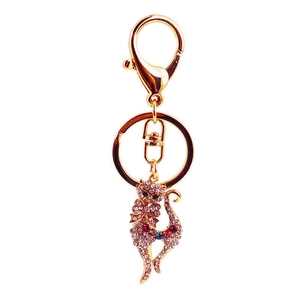 Sparkling crystal fox keychain in gold alloy with pink rhinestones and blue gems