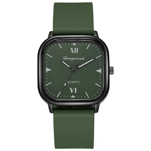 Detailed close-up of dark green square quartz watch dial with Roman numerals and black case