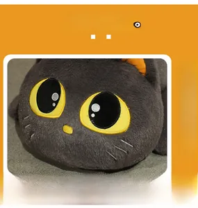 Close-up of black plush cat toy featuring yellow embroidered eyes and soft velvet texture