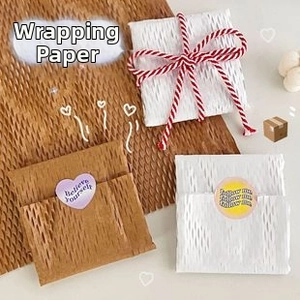 Eco-friendly honeycomb buffer wrapping paper for gifts with heart stickers and cotton twine