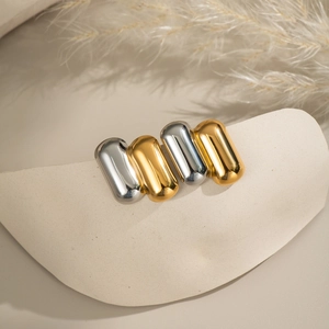 Geometric stainless steel stud earrings in gold and silver finish with textured design