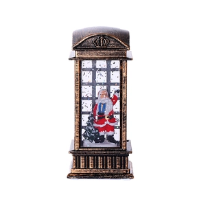 Bronze vintage Christmas lantern telephone booth with Santa Claus inside and sparkling sequins