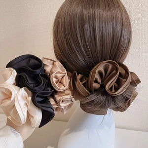 Satin silk hair scrunchies set in beige, black, and champagne for elegant ponytails