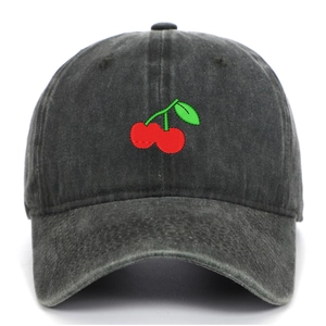 Detailed close-up of cherry embroidery on washed cotton vintage baseball cap texture