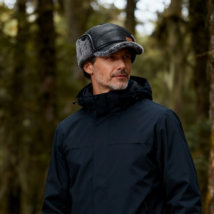 Men's winter faux leather baseball cap with earflaps and warm faux fur lining