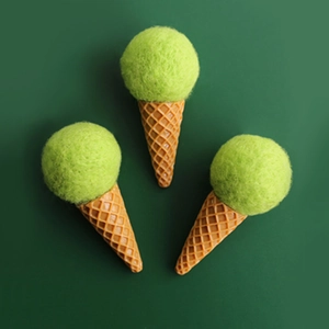Three handmade wool felt ice cream tree ornaments in green and brown waffle cones