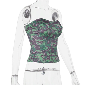 Detail view of camouflage print corset top featuring boning structure on clear mannequin