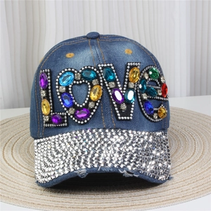 Detail of denim baseball cap with LOVE gemstone embroidery and rhinestone brim