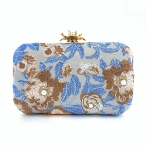 Elegant blue-gray evening clutch bag with gold floral embroidery and pearl accents