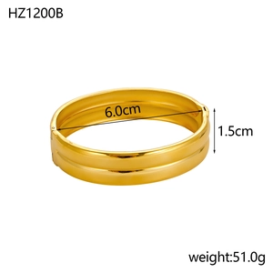 Minimalist gold round bangle with 1.5cm width and 6.0cm diameter on a white background