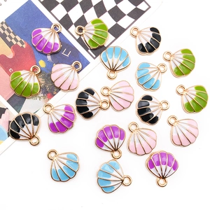 DIY colorful shell pendants with gold frames for ocean-style jewelry making
