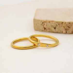 Macro shot of 18K gold plated stainless steel Virgo zodiac ring with zircon stones