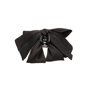 Elegant large black fabric bow hair claw clip with a matte satin finish for women
