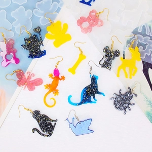 DIY animal resin earring molds with colorful cat and butterfly pendants and silicone tools