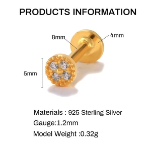 Macro detail of 925 sterling silver ear piercing jewelry with technical dimensions
