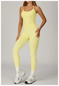 Detailed texture of seamless lemon yellow sports set featuring high-waist yoga leggings