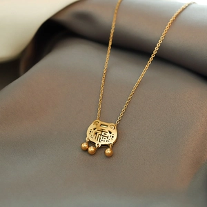 18K rose gold plated titanium steel necklace with longevity lock pendant on grey silk