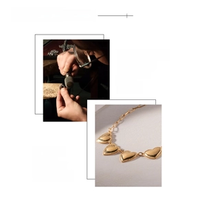 Macro detail of heart necklace with 18K gold vacuum plating and manual polishing
