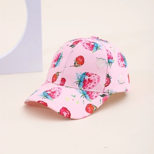 Pink kids baseball cap featuring watercolor strawberry print and curved brim on white background