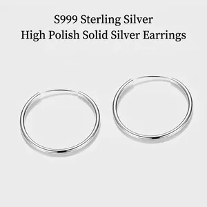 Minimalist S999 sterling silver hoop earrings with a high-polished smooth surface finish