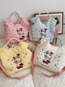 Quilted cotton tote bags with cartoon dachshund embroidery in pink, blue and yellow