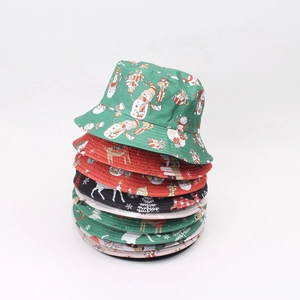 Festive reversible Christmas bucket hat with reindeer and snowman patterns for women