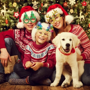 Family wearing Christmas party glasses with reindeer and tree designs for holiday fun