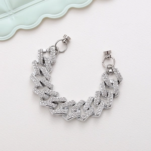 Detailed close-up of a silver rhinestone Cuban chain strap with a magnetic clasp closure
