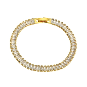 Elegant gold tennis bracelet featuring AAA rectangular zircon stones and secure fold-over clasp