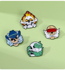 Set of four punk enamel skull pins featuring flame and cowboy themes for backpack decor
