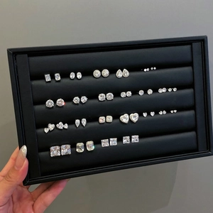 Close-up of S925 sterling silver stud earrings with 5A cubic zirconia in various shapes