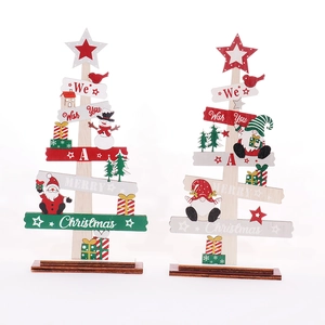 Handcrafted wooden Christmas tree ornaments with Santa and gnome, festive tabletop decor