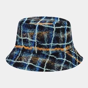 Detail showing blue and orange checkered pattern on a durable canvas bucket hat