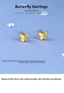 Macro shot of 925 sterling silver golden butterfly stud earrings on blue background