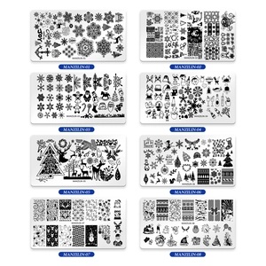 Set of 8 Christmas nail art stamping plates featuring snowflakes and reindeer patterns