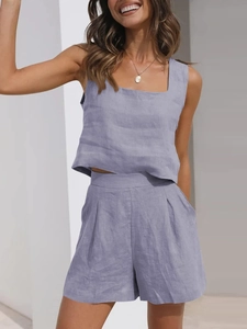 Detail of lavender linen two-piece set featuring square neck sleeveless top and shorts