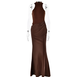 Sleeveless deep brown halter maxi dress with patchwork satin pleated skirt on mannequin