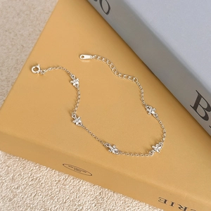 S925 sterling silver floral bracelet with five delicate flower pendants and adjustable chain